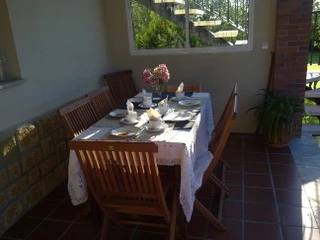 Tables for breakfast on the terrace in Villaviciosa